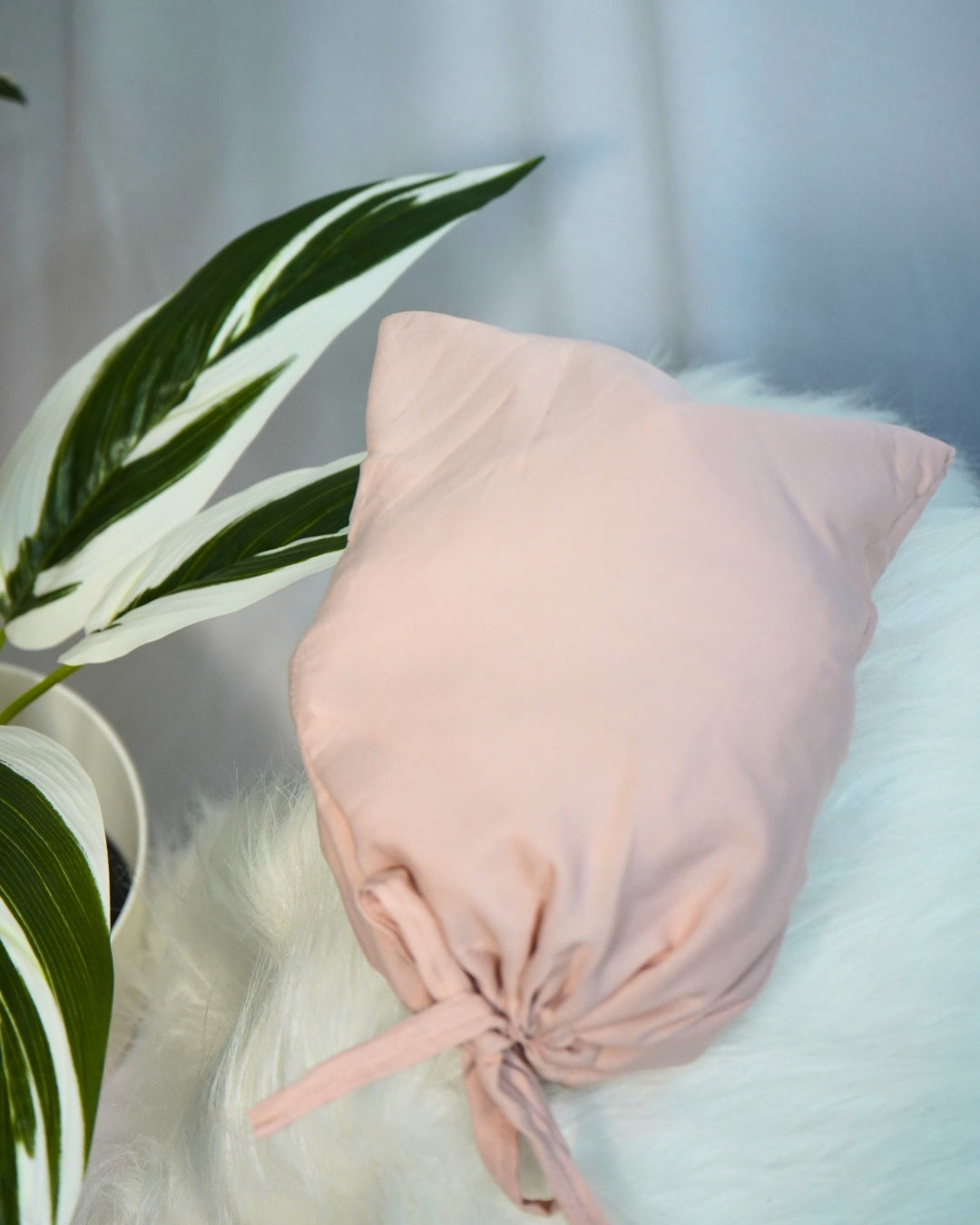 Matching beige pouch for polyester lycra prayer dress.