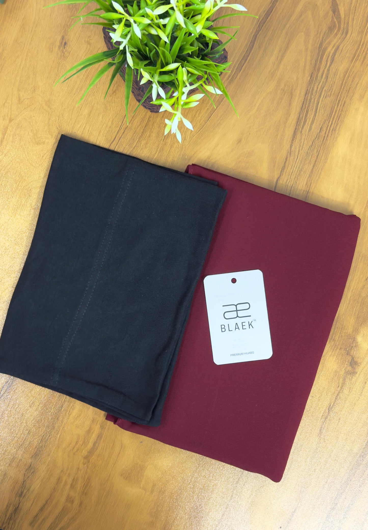 Bold cherry red instant hijab with a smooth, built-in black cap for a perfect fit.