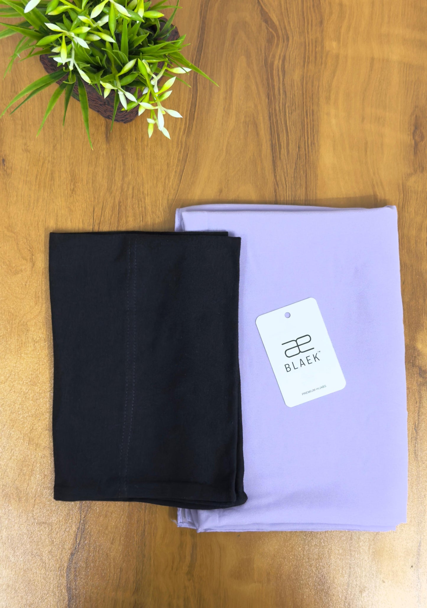 Graceful lavender instant hijab with a seamless black undercap.
