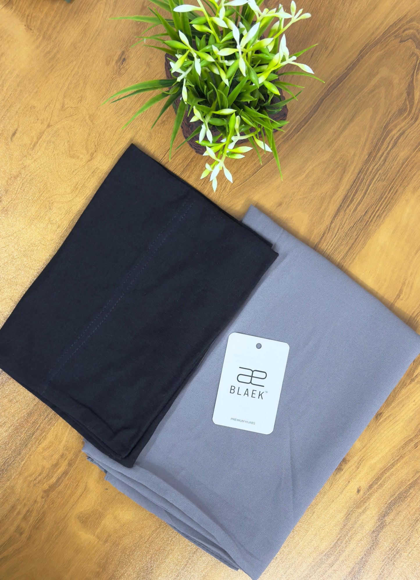 Modern smoke grey instant hijab with a neatly integrated black cap.
