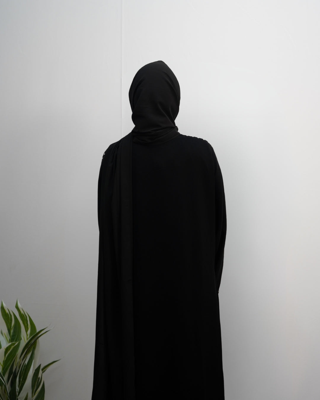 Modest fashion black indian chiffon hijab with soft flowy texture.