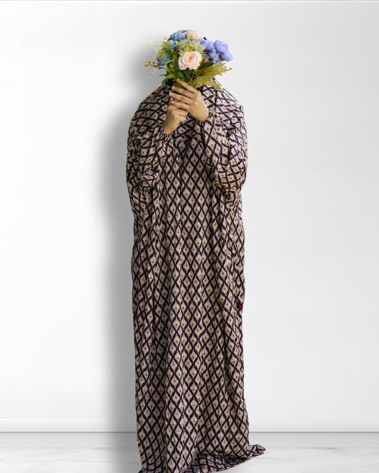 Brown diamond print polyester lycra prayer dress full length front view with floral bouquet.