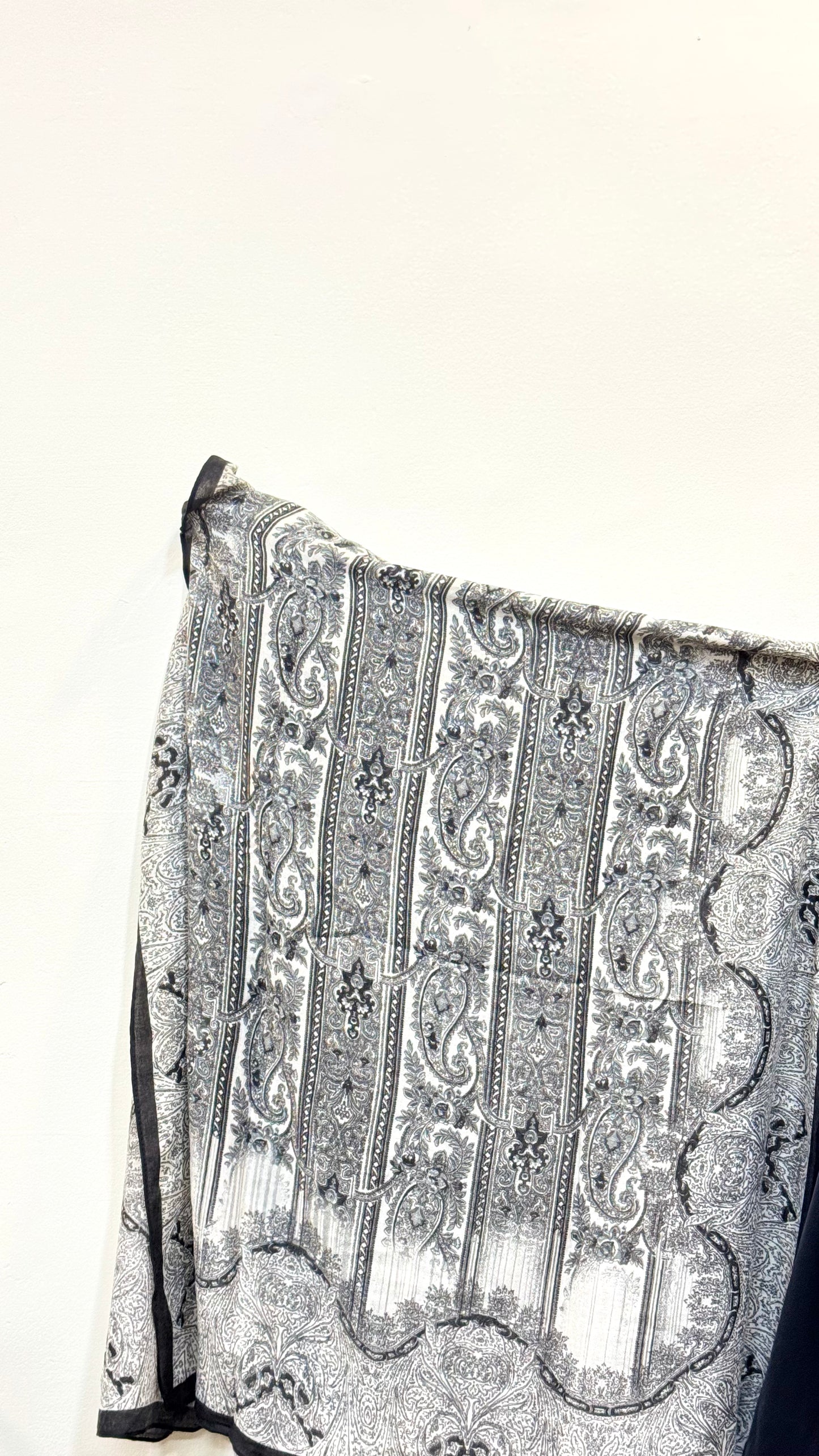 Carbon black pashmina hijab with a smooth, comfortable feel, adding a chic, refined touch to any ensemble.