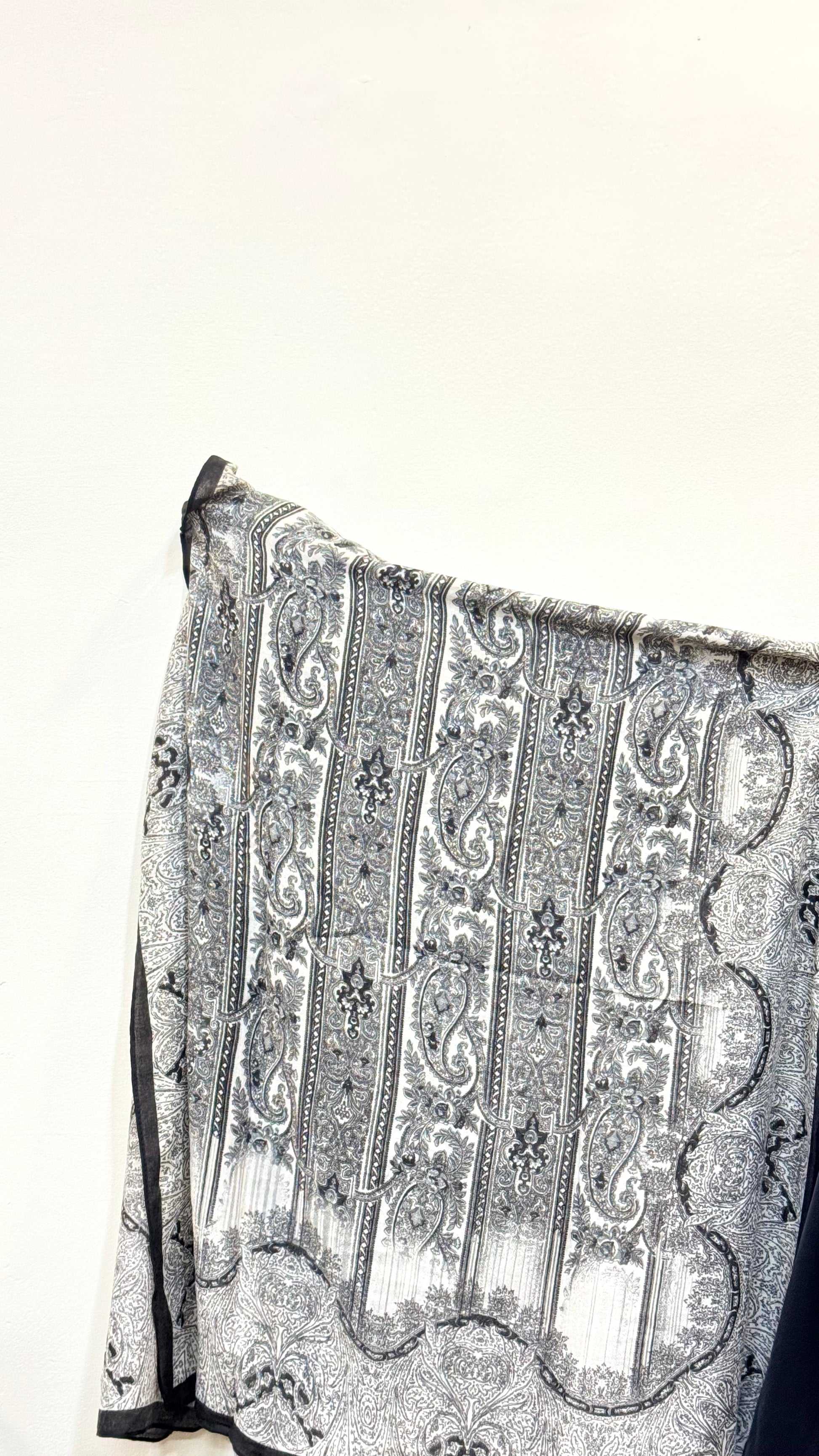 Carbon black pashmina hijab with a smooth, comfortable feel, adding a chic, refined touch to any ensemble.