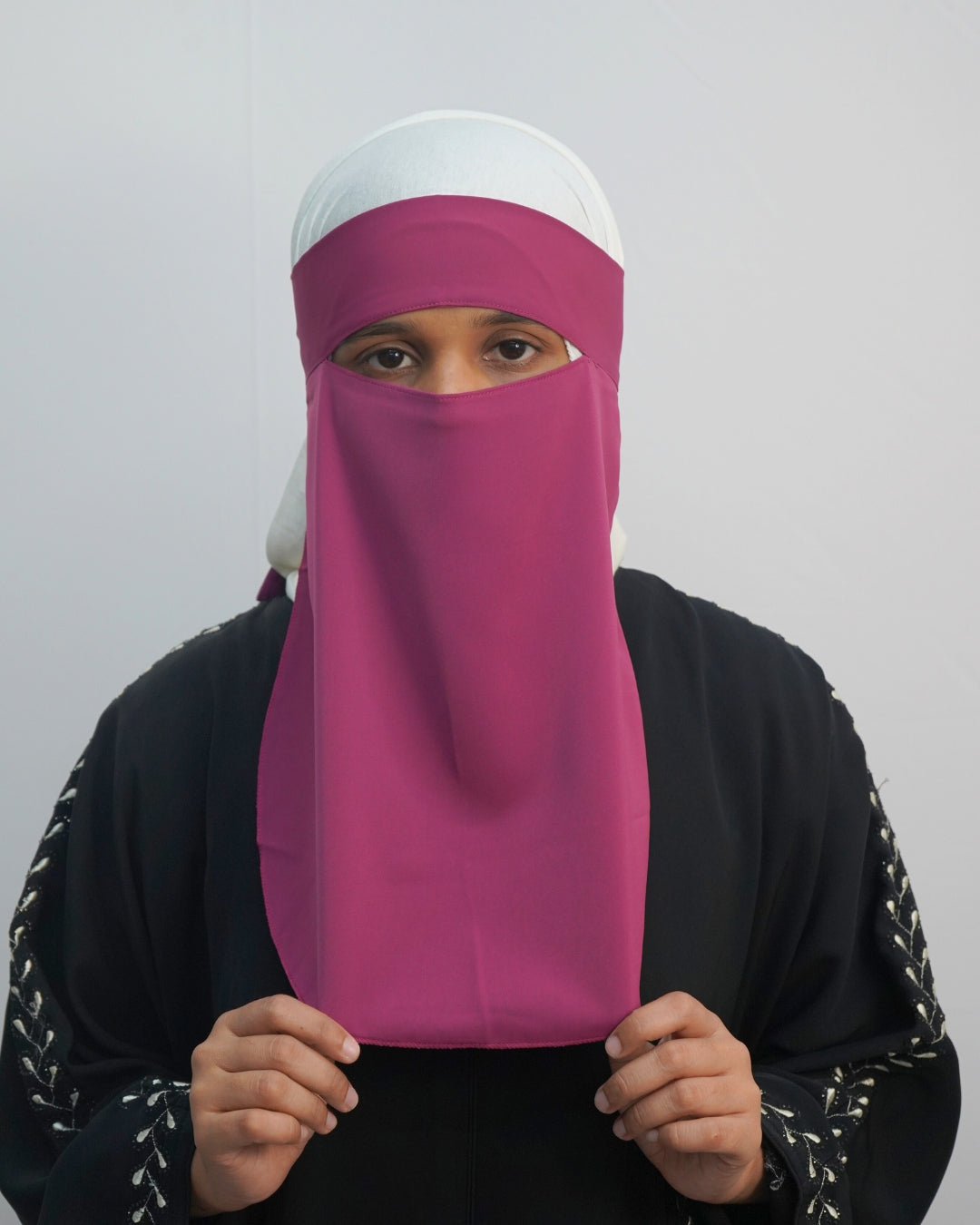 Deep magenta one layer niqab with tie-back design, front view.