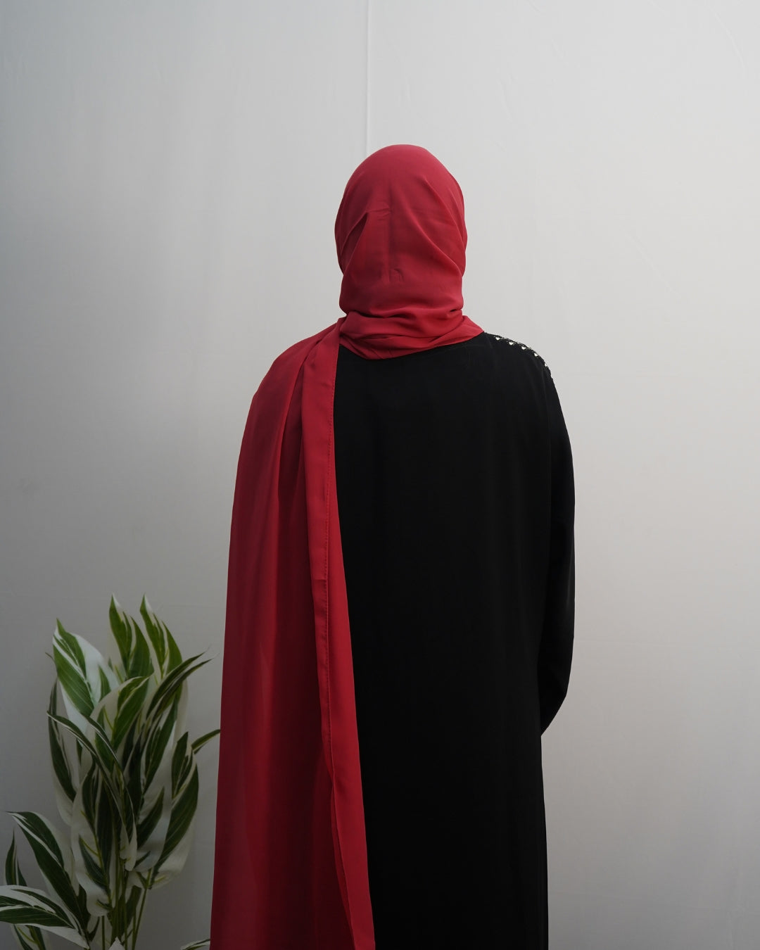 Deep red chiffon hijab with soft lightweight drape for women.