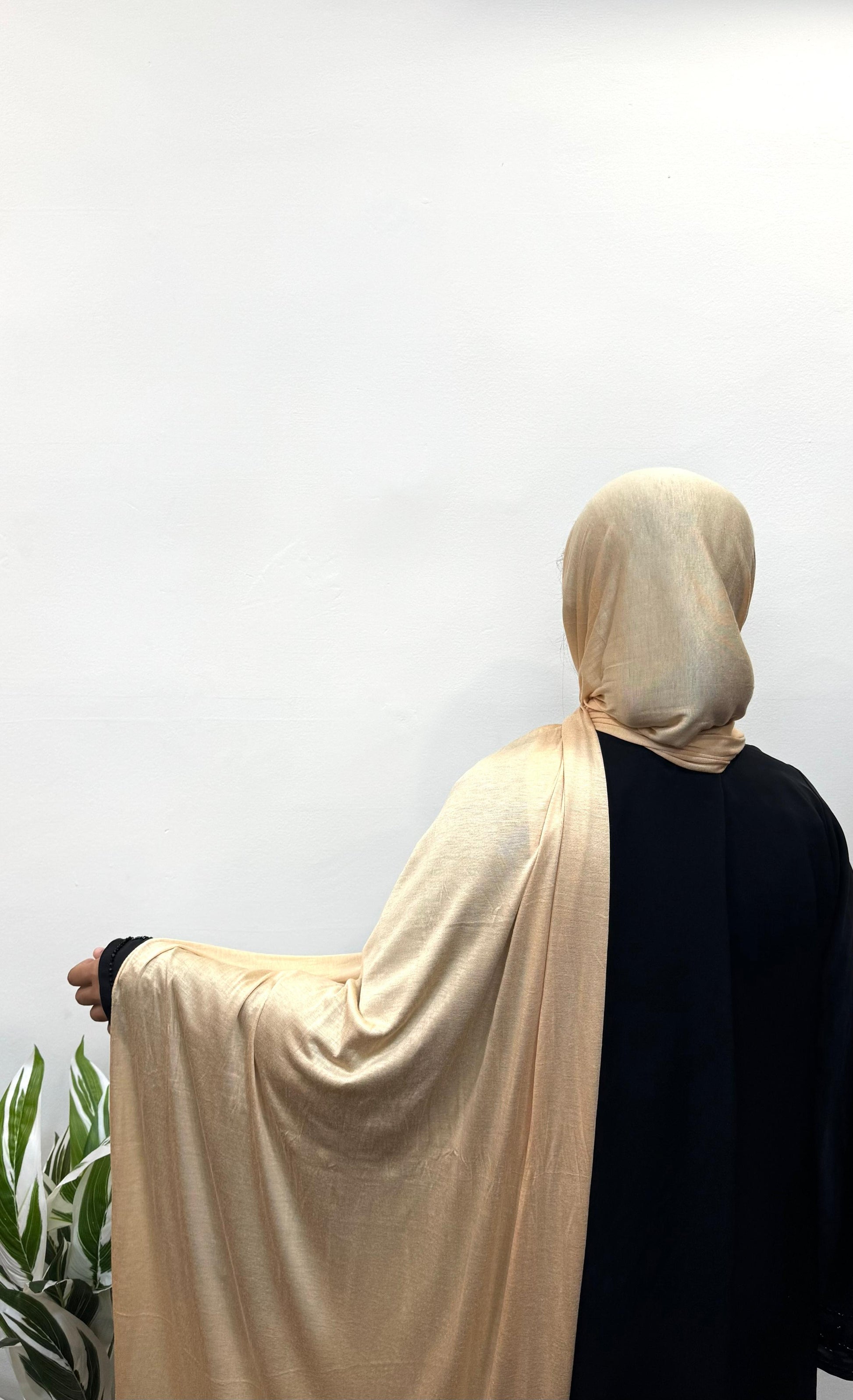 Desert yellow jersey hijab styled for everyday modest fashion.