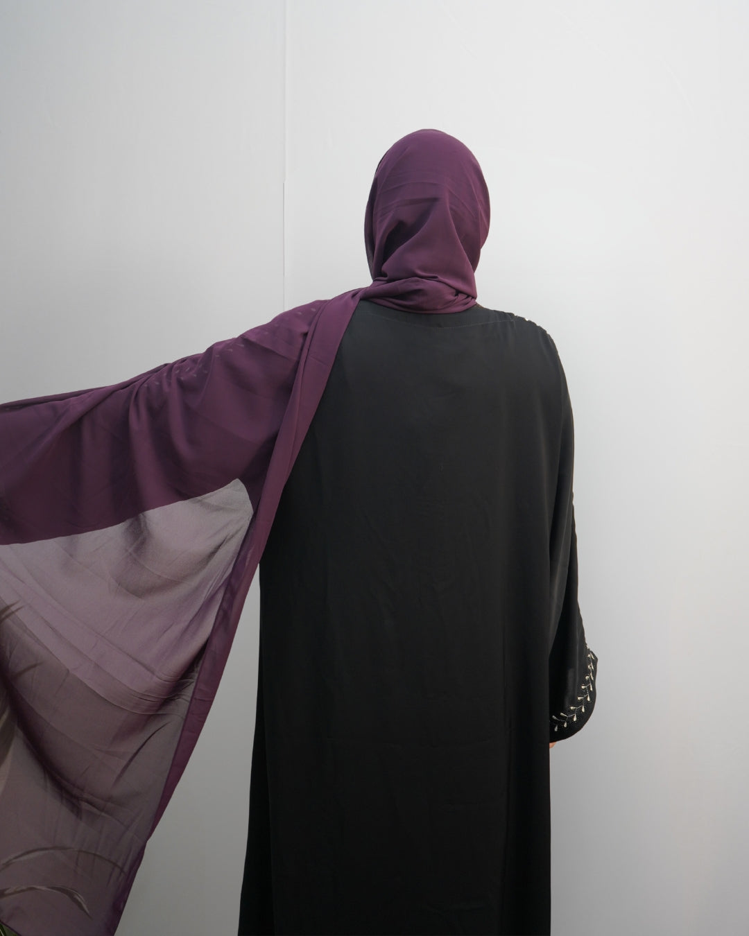 Close-up of grape indian chiffon hijab showing rich purple tone and smooth texture.