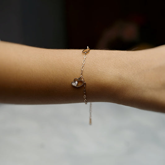 Rose Gold Bracelet with a stylish pendant charm.