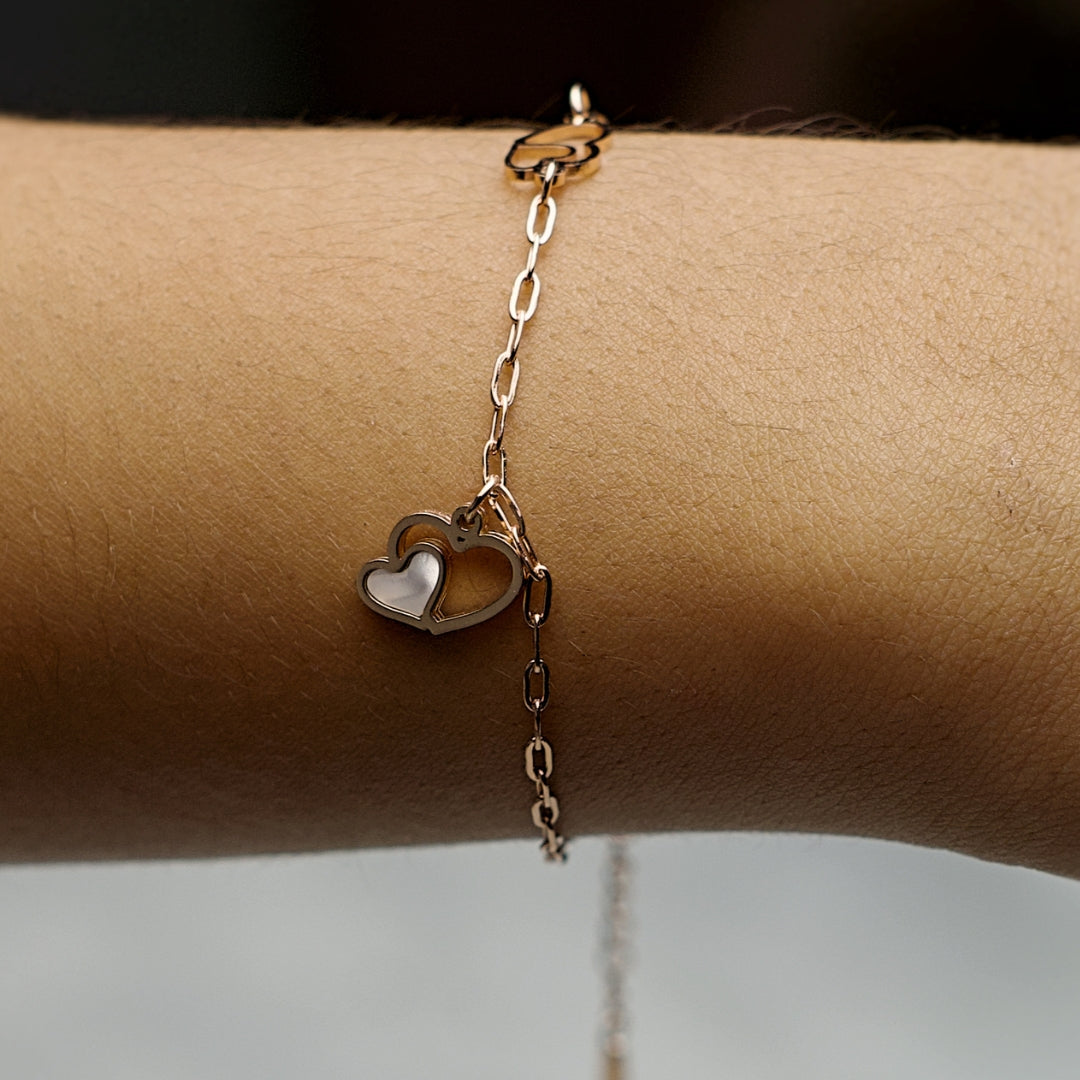 Rose Gold Bracelet with a stylish pendant charm.