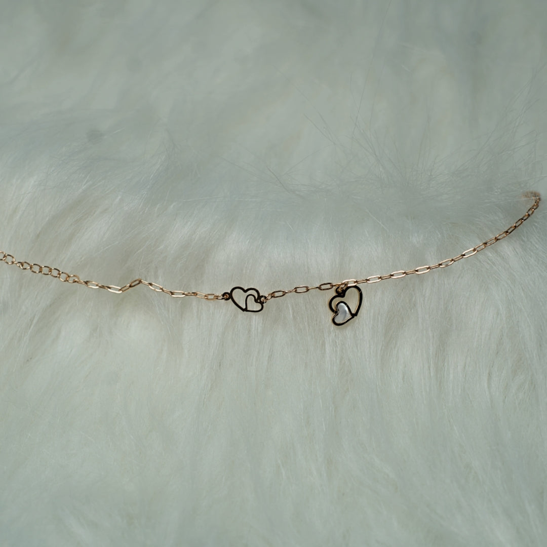 Rose Gold Bracelet with a stylish pendant charm.