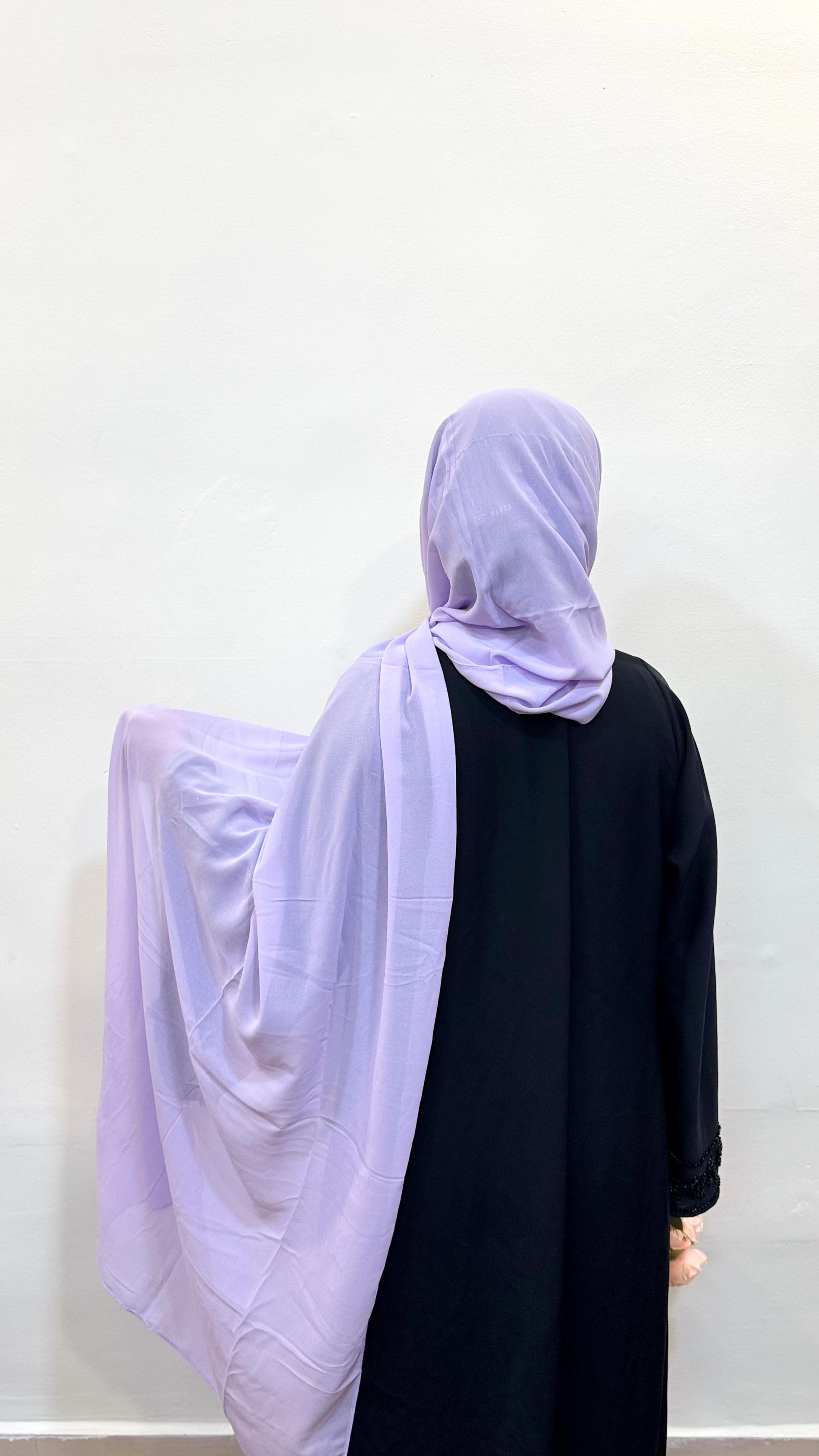 Soft lavender hijab made of chiffon fabric, worn with a  traditional pardha outfit.