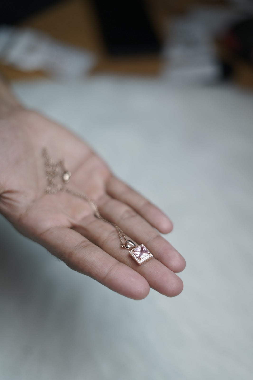 Lavender Luxe Necklace held in palm for scale and detail.