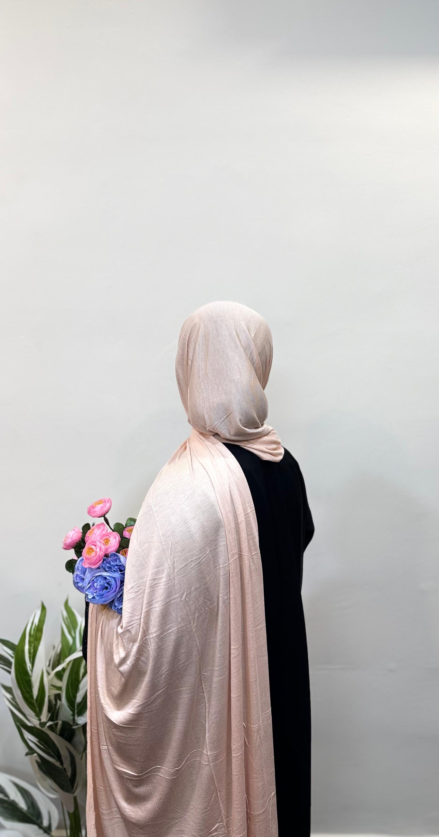 Millennial pink jersey hijab with clean, minimalist wrap.