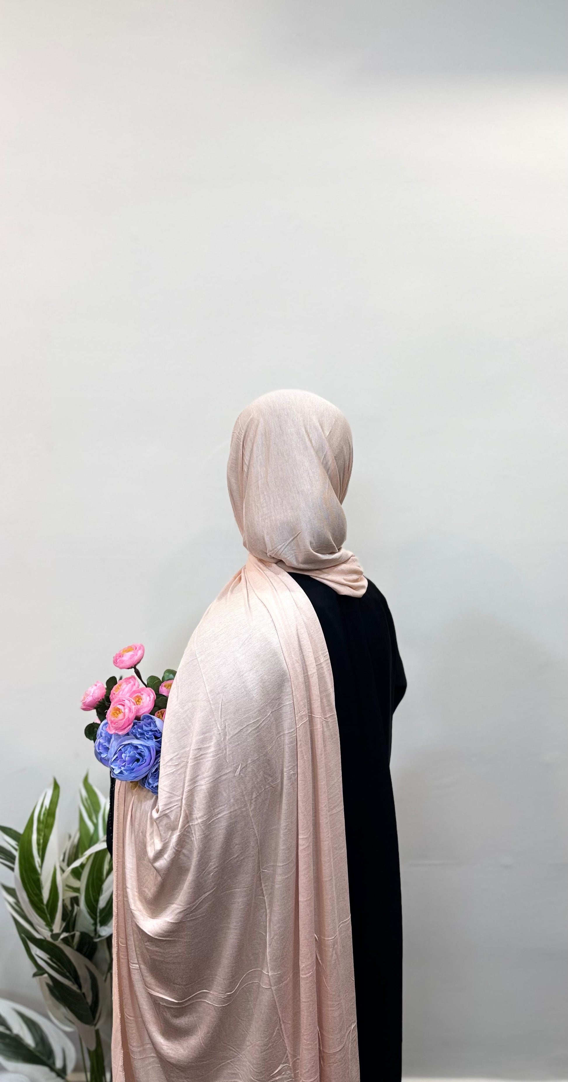 Millennial pink jersey hijab with clean, minimalist wrap.