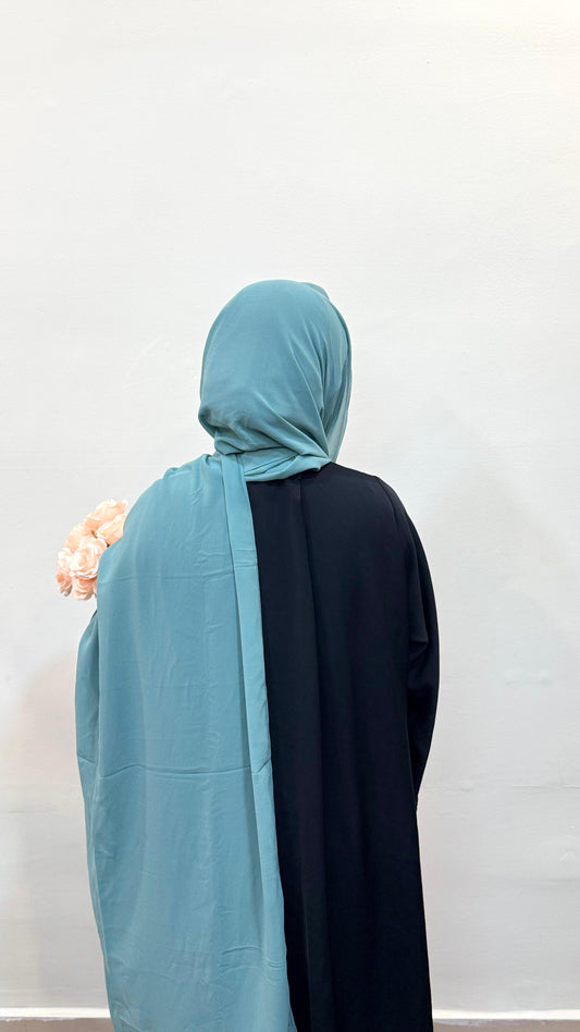 Mint green chiffon scarf offering a soft, refreshing tone.