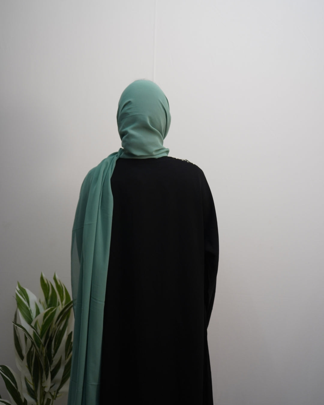 Lightweight chiffon hijab in mint green, perfect for daily wear.