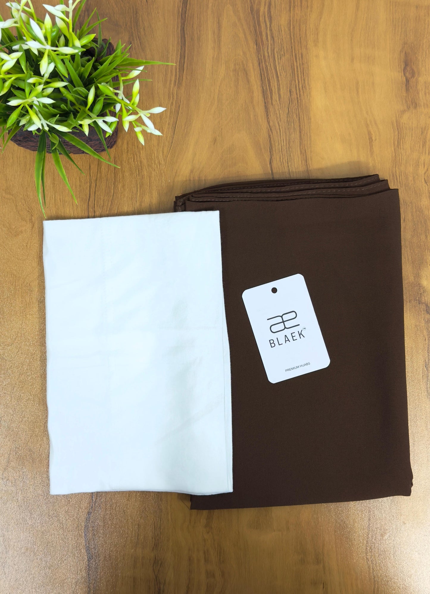 Warm mocha hijab with a crisp white cap for a striking contrast.