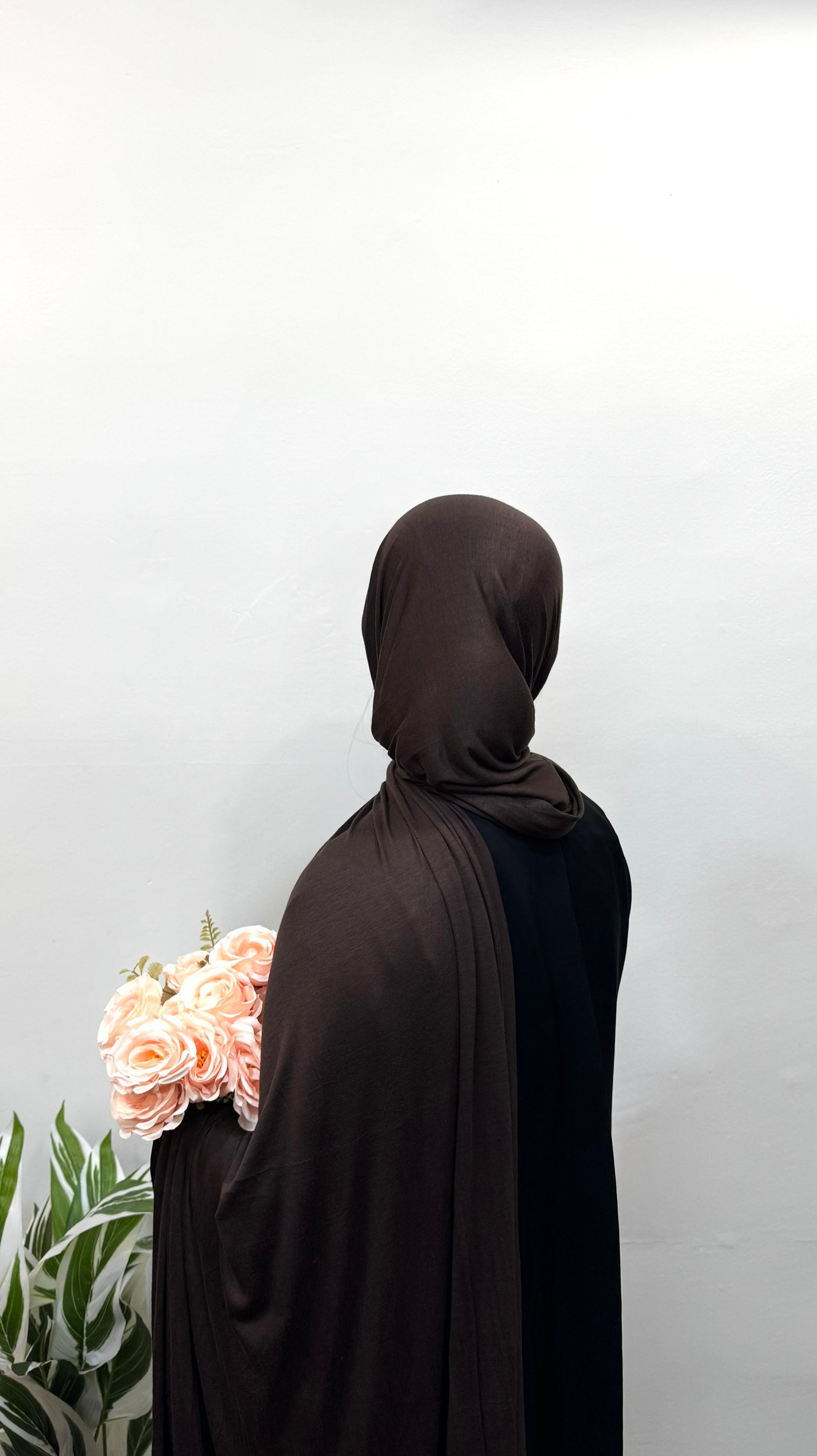 Mocha jersey hijab adding a neutral touch to casual look.