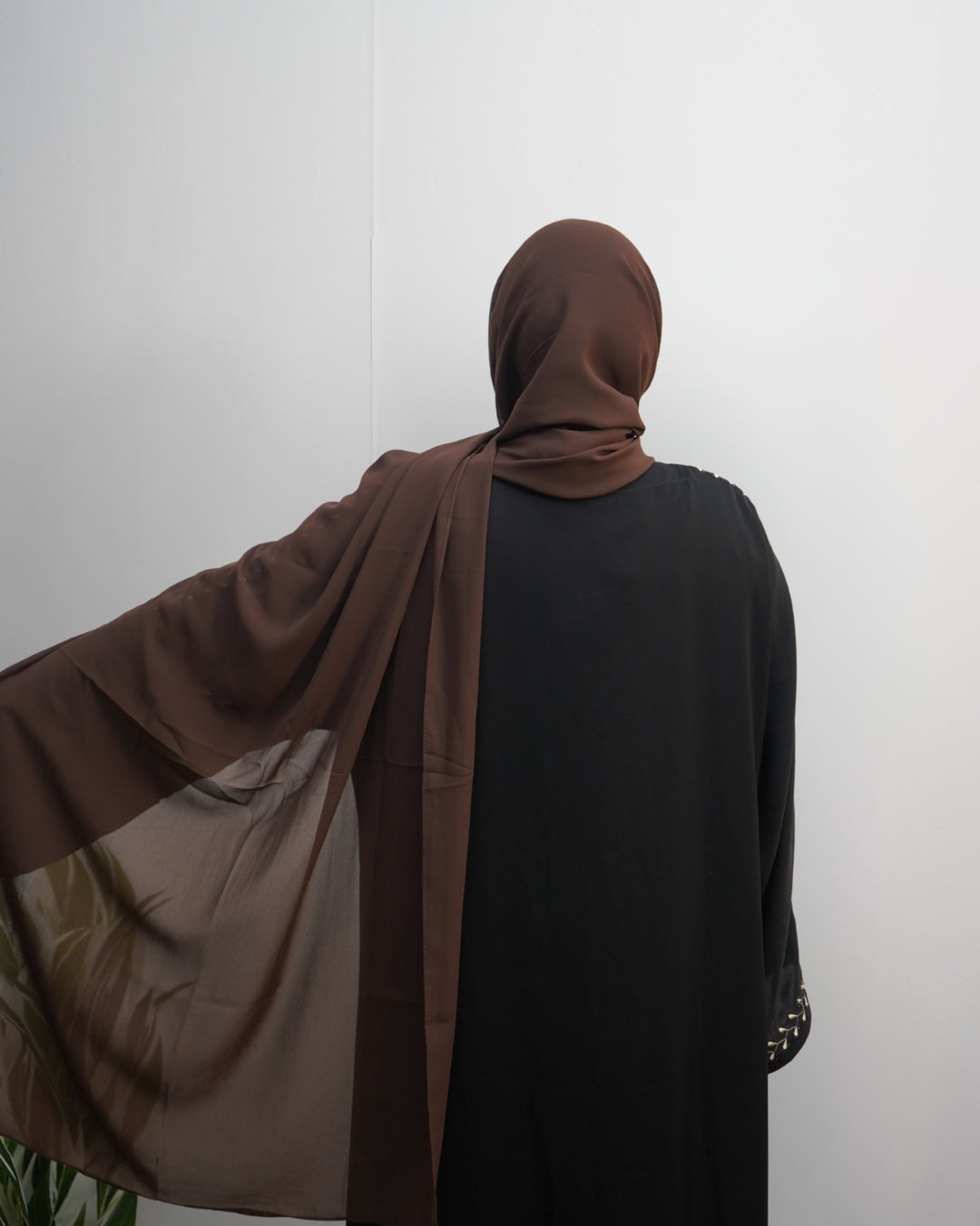 Lightweight mocha brown chiffon hijab with smooth flowy drape.