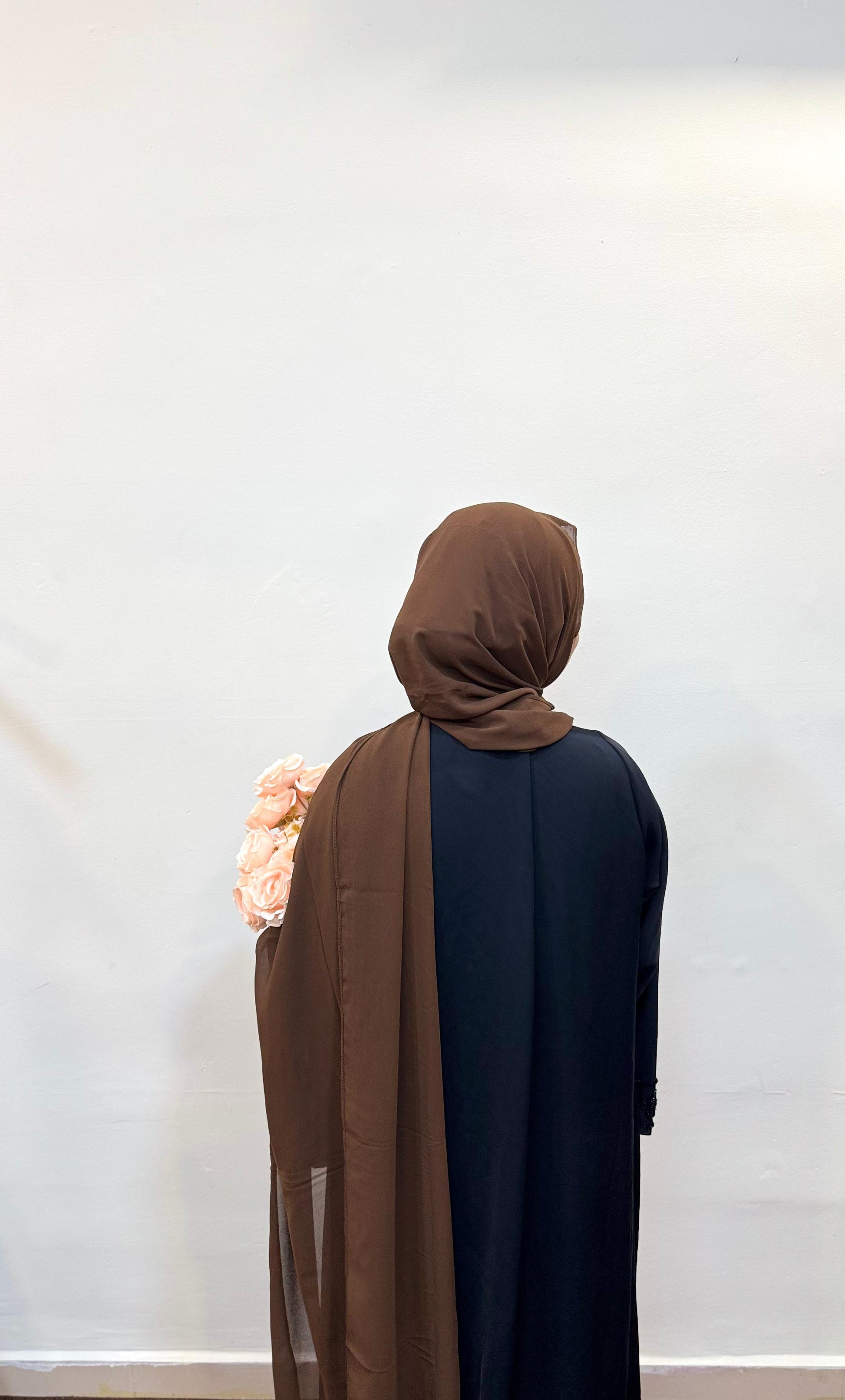 Mocha chiffon scarf with a soft, elegant finish.