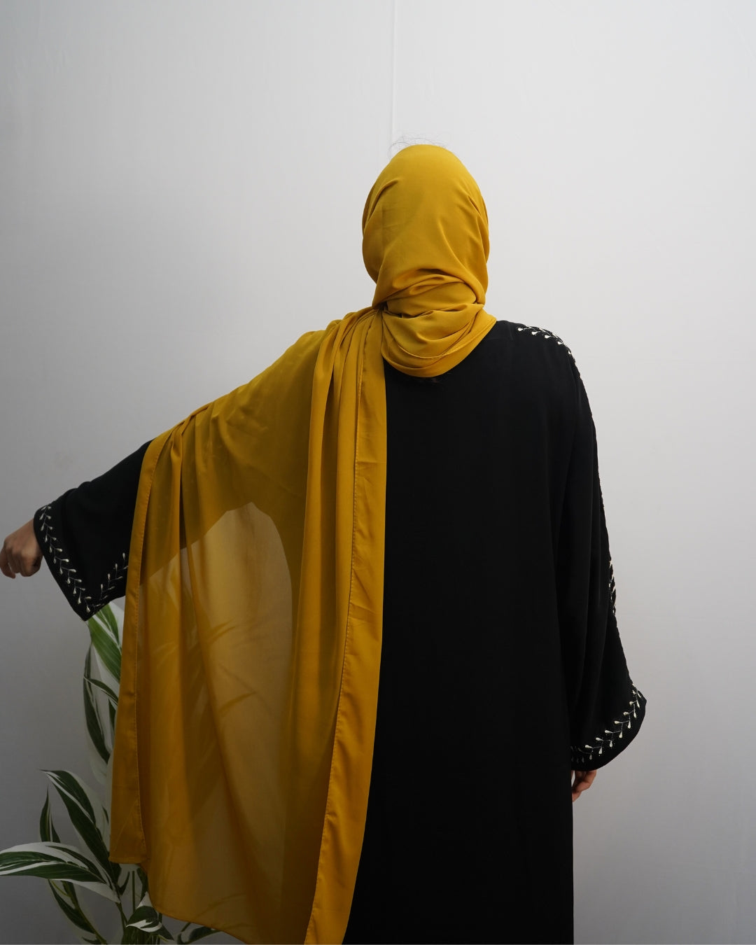 Vibrant mustard yellow hijab made from premium chiffon, lightweight and flowy.