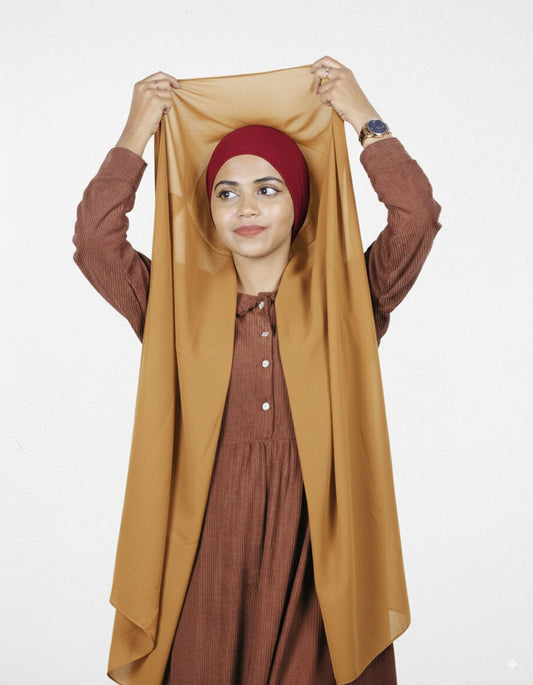 Pre-stitched mustard instant hijab with cherry cap for everyday wear.