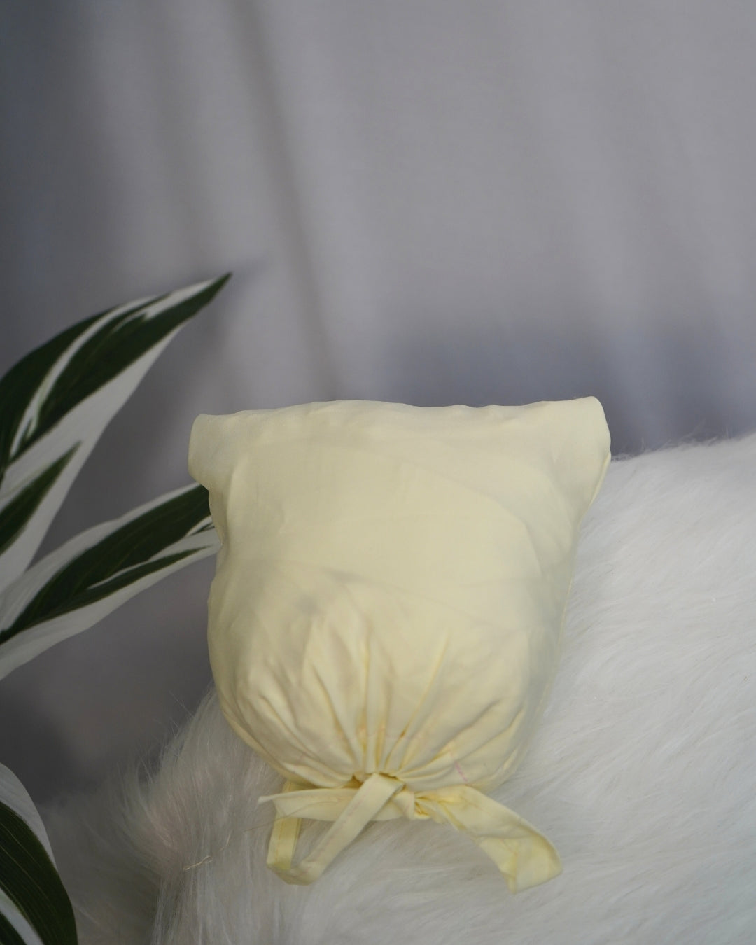 Matching off white pouch for polyester lycra prayer dress.