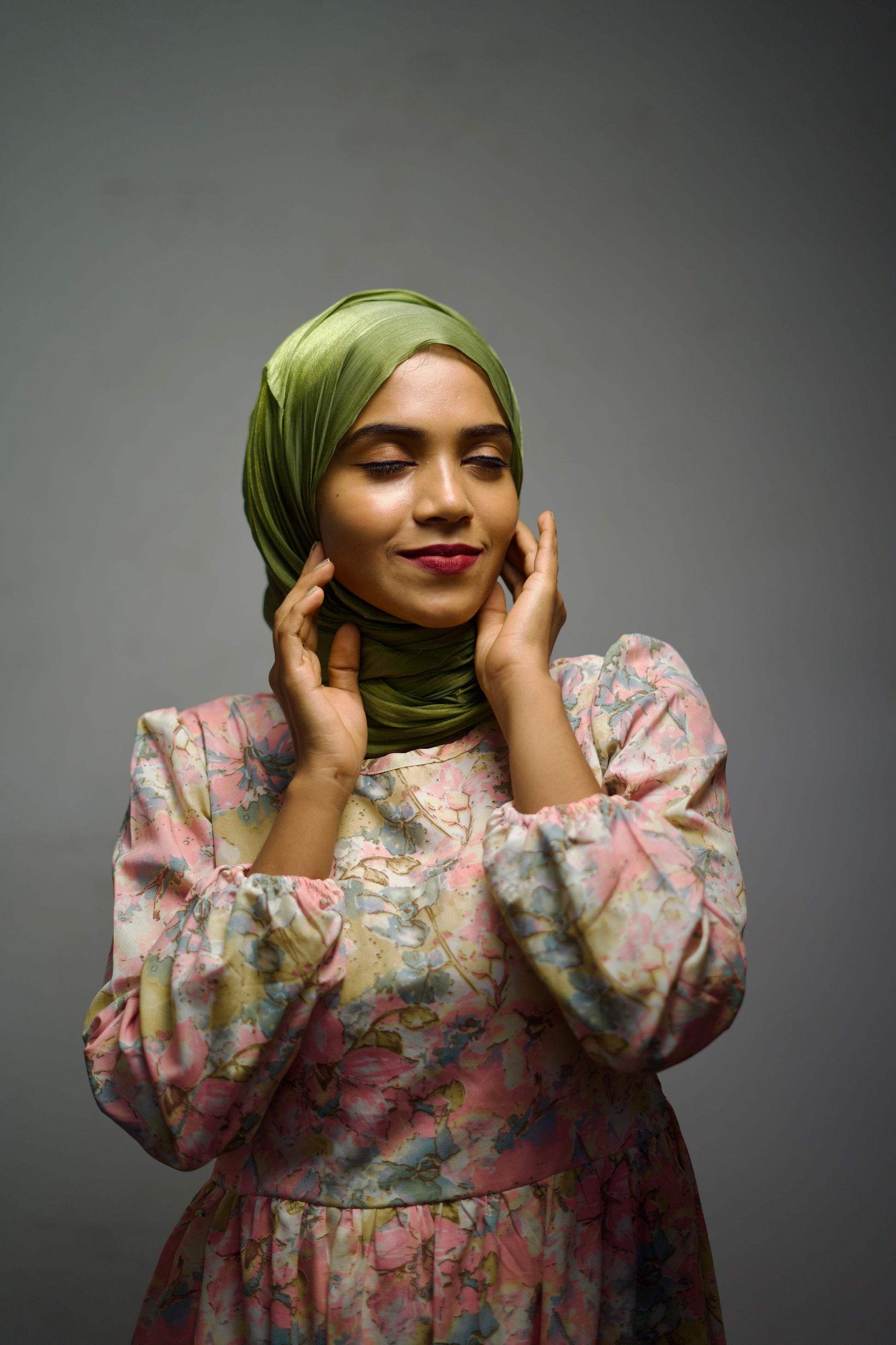 Olive Green Shimmer Hijab styled with light draping and shimmer effect.