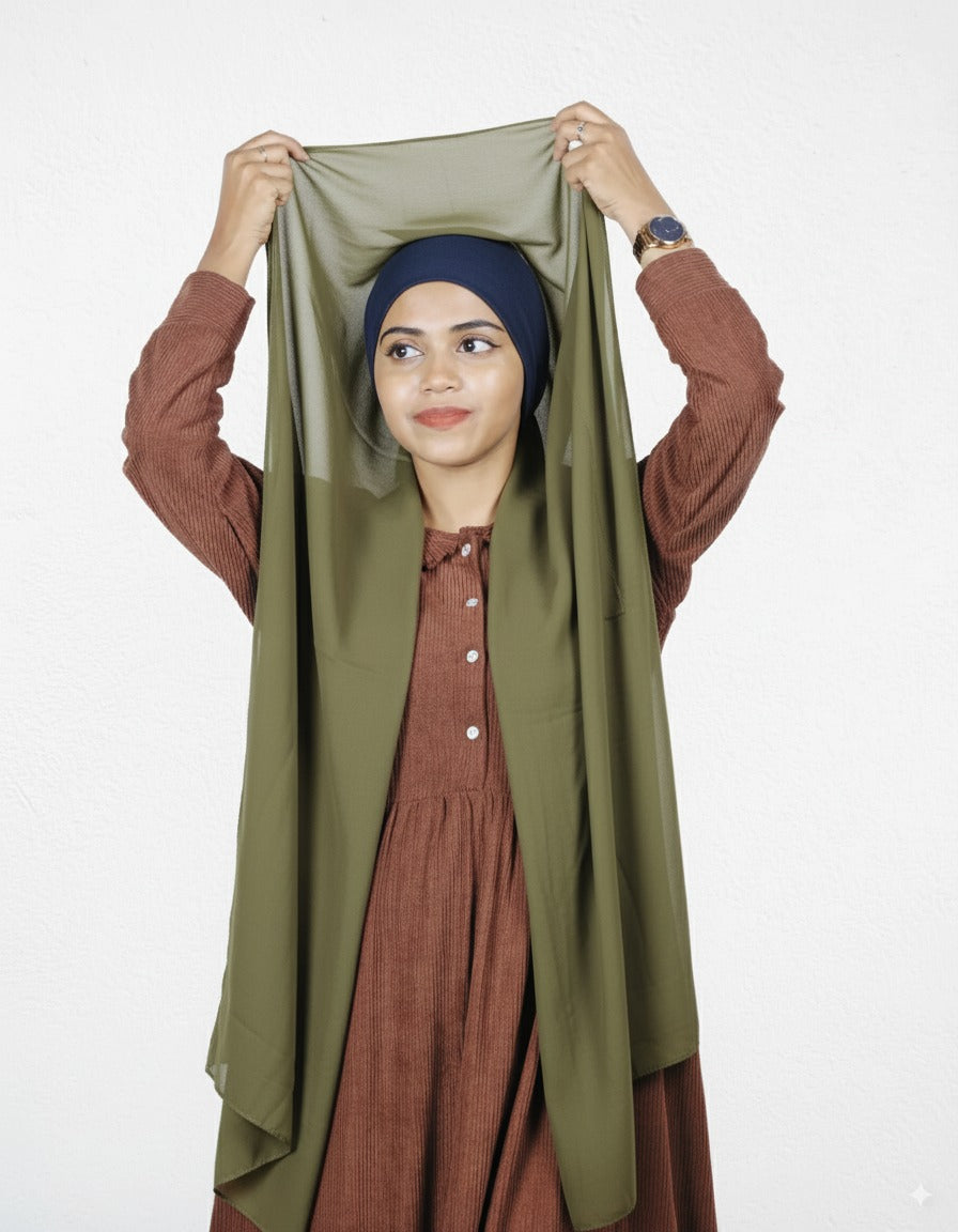 Slip-on olive green hijab with navy blue cap, premium chiffon fabric.