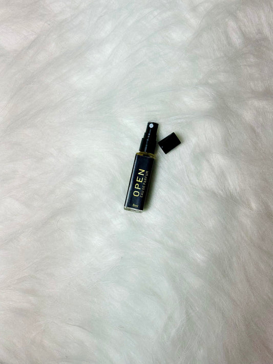 Open Sample 8ml bottle displayed with top open on a plain white background.
