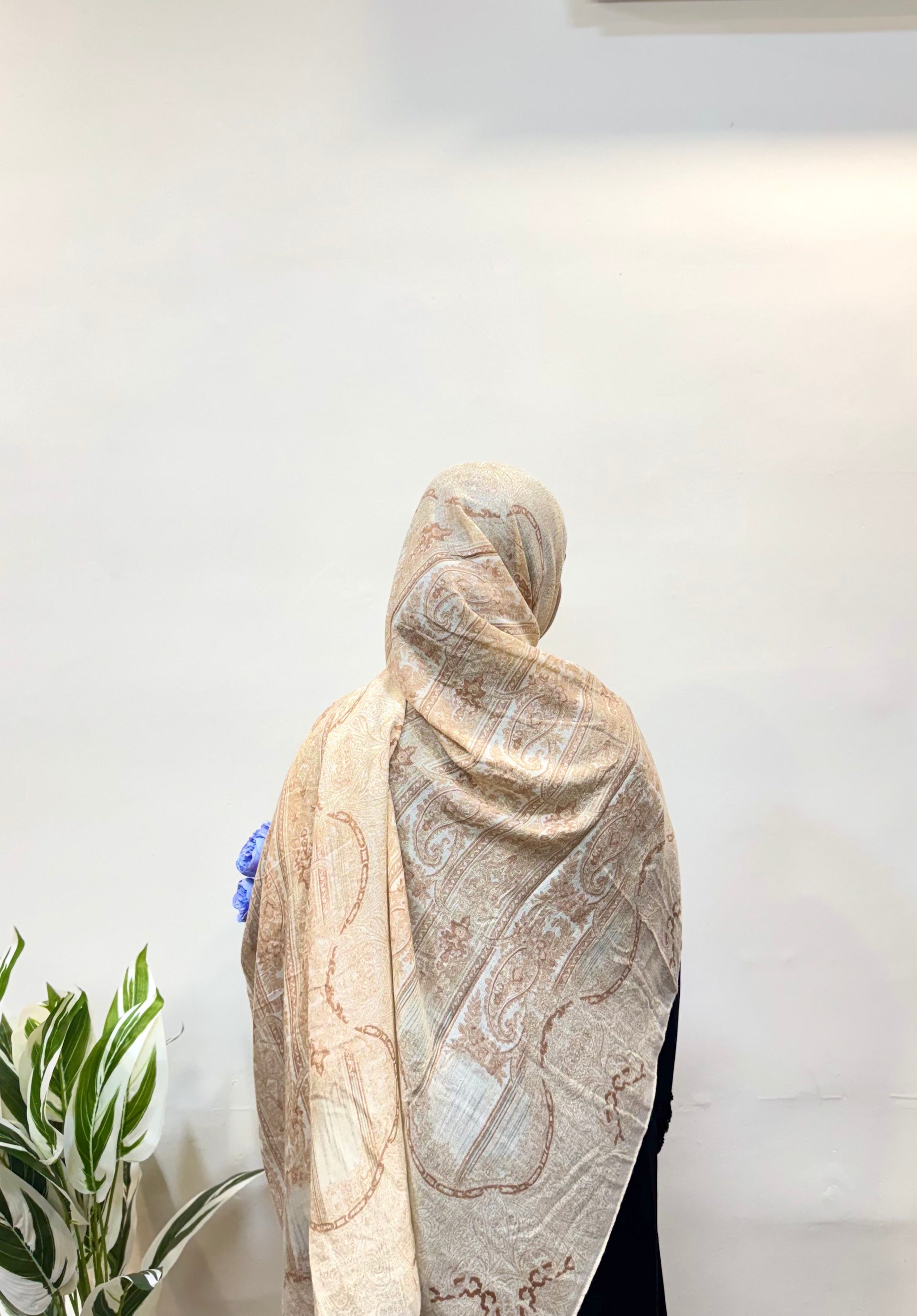 Soft pale yellow hijab, lightweight and breathable, offering comfort and a refined, versatile look.