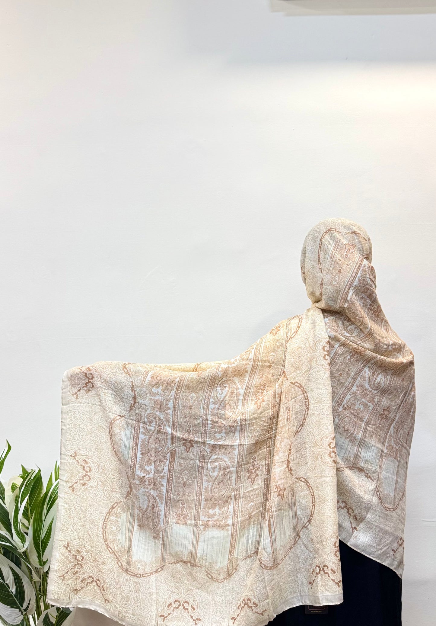 Soft pale yellow hijab, lightweight and breathable, offering comfort and a refined, versatile look.