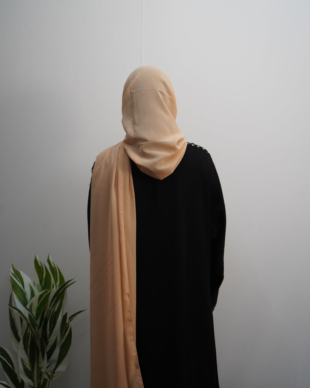 Lightweight mocha brown chiffon hijab with smooth flowy drape.