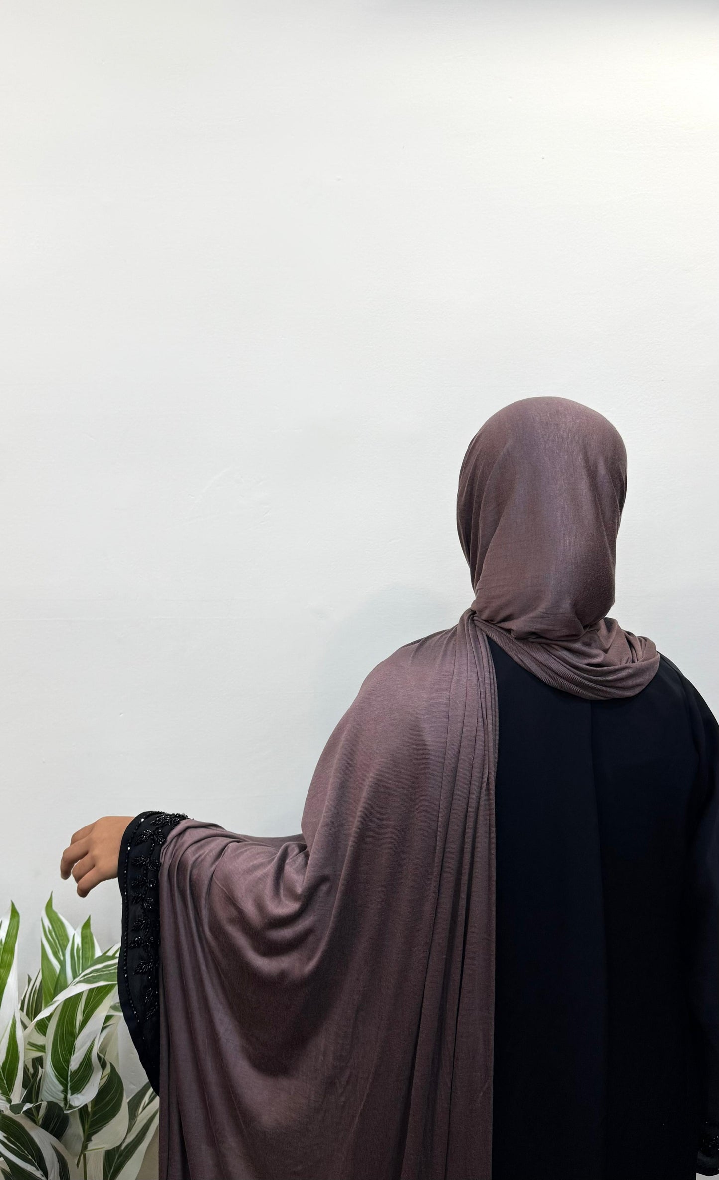 Teddy jersey hijab draped loosely for an elegant, relaxed look.