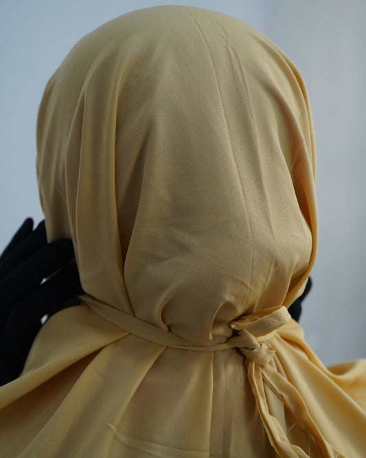 Modest prayer outfit showing adjustable tie at back of head.