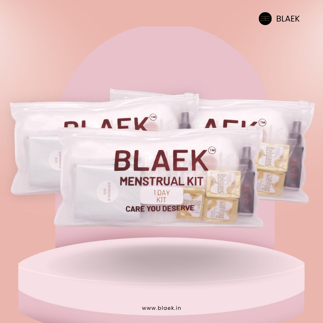 Front view of Three 1 day Period Kits with sanitary pads, wet wipes, chocolates, and accessories.