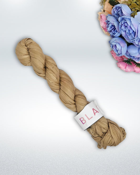 Beige cotton hijab with embellished fringe edges, lightweight breathable fabric ideal for modest styling and everyday wear.