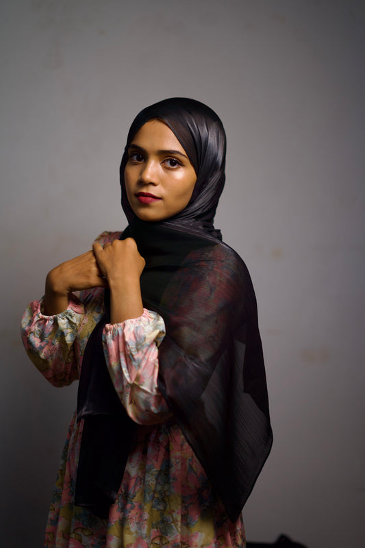 Black Shimmer Hijab worn with a clean wrap and soft shimmer.