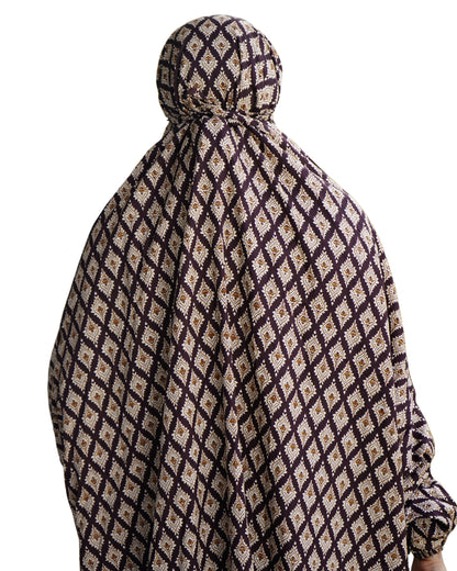 Back view of brown floral khimar style prayer dress with tie-back and full coverage.