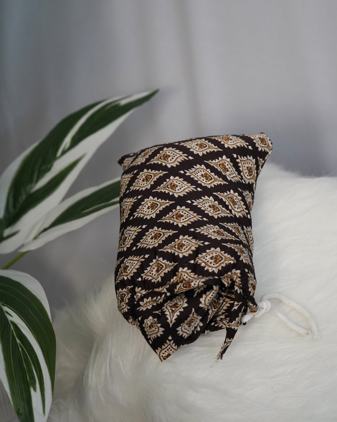 Matching printed pouch for brown diamond print prayer dress.