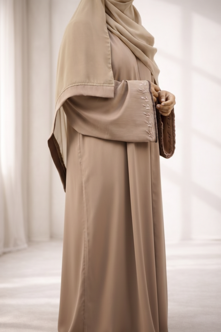 A woman elegantly wearing the Tiktok Indonesian Abaya, showcasing its beautiful drape and comfortable fit.