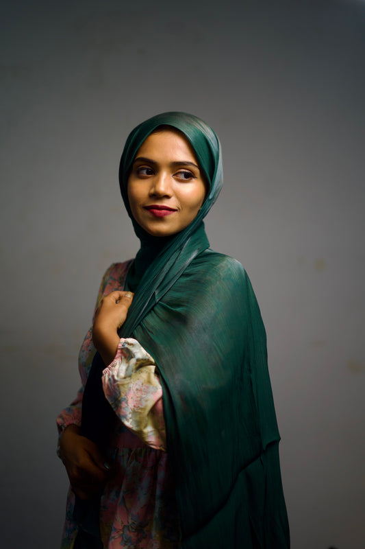 Brunswick green shimmer hijab worn with a smooth, clean wrap.