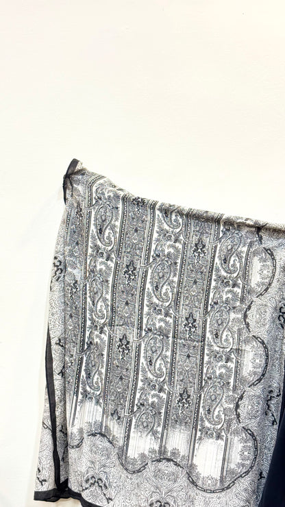 Carbon black pashmina hijab with a smooth, comfortable feel, adding a chic, refined touch to any ensemble.