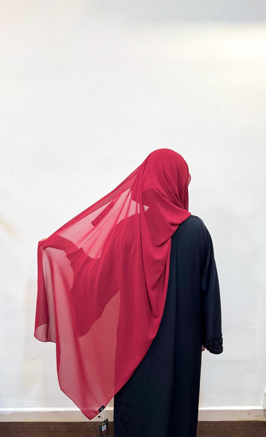 Cherry red hijab with a subtle shine and lightweight feel.