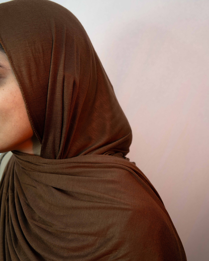 Close up chocolate brown jersey hijab soft fabric smooth drape modest scarf
