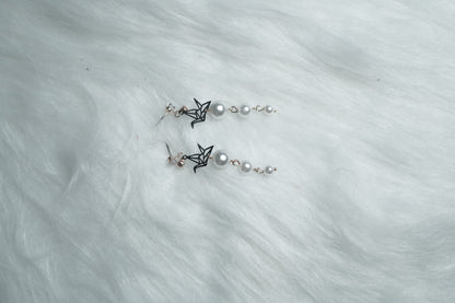 Crystal Origami Pearl Drop Earrings laid flat on clean background
