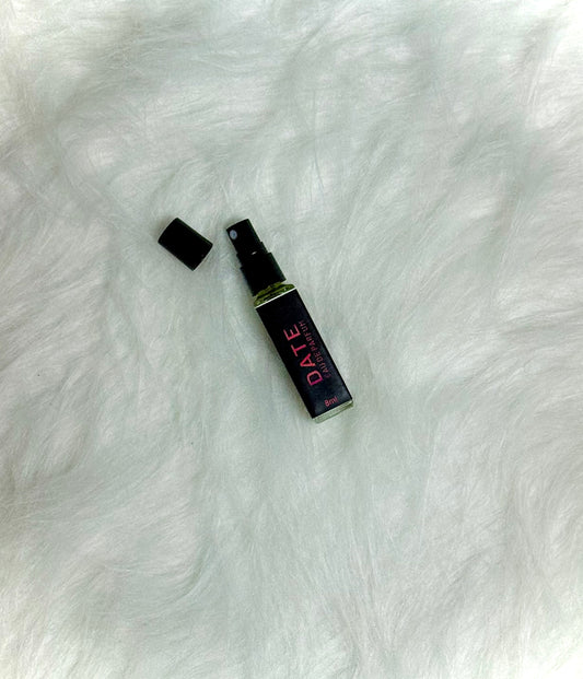 Top view of Date Perfume 8ml placed on a plain white background.