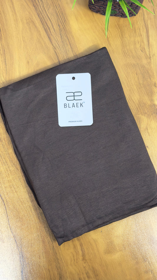 Minimalist dry wood jersey hijab for effortless styling.