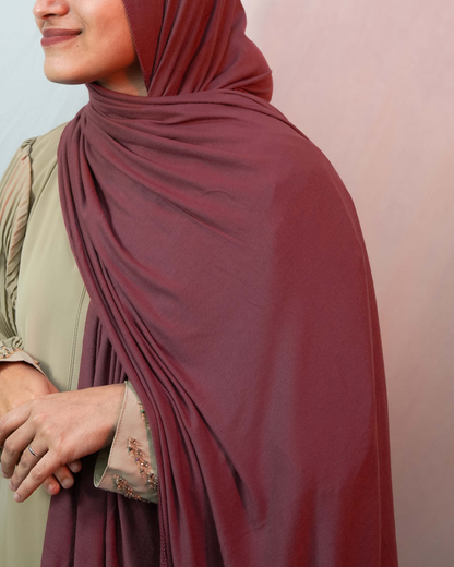 Side view dusty mauve jersey hijab smooth drape lightweight stretch comfortable modest scarf